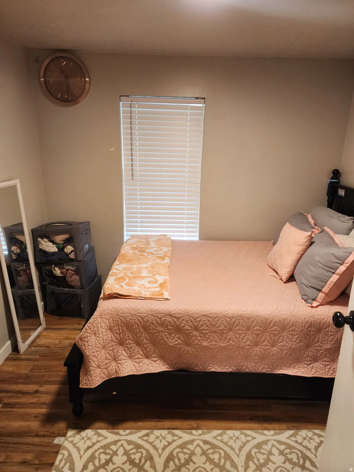 Bedroom with wood finished floors