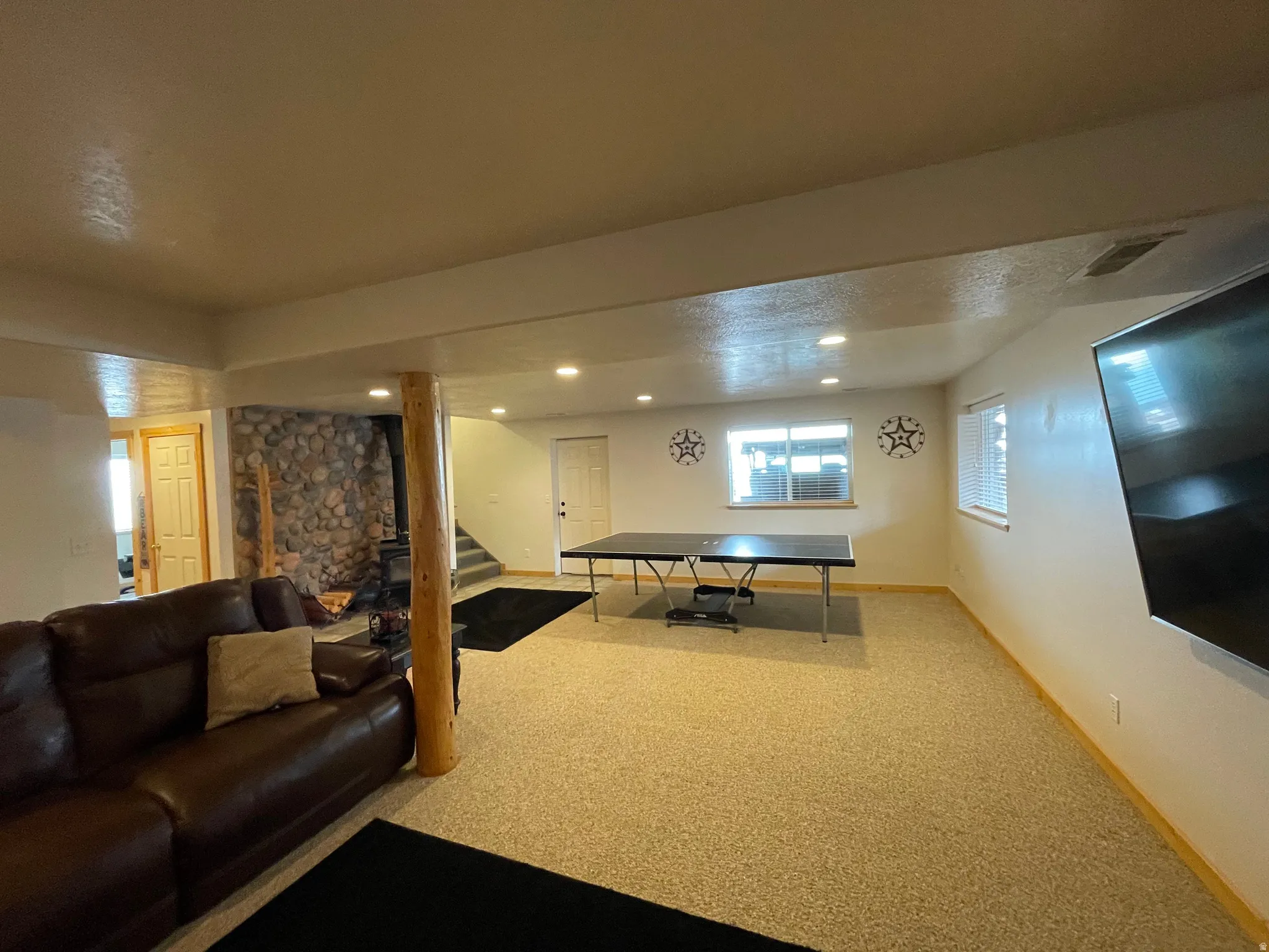 Playroom with carpet and recessed lighting