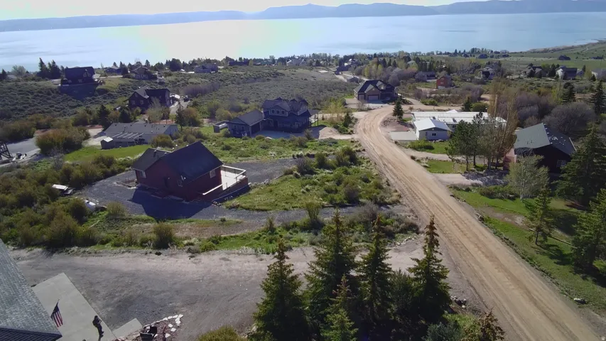 Elevated property offering a distant lake backdrop and surrounding mountain terrain