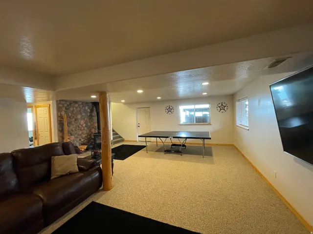 Playroom with carpet and recessed lighting