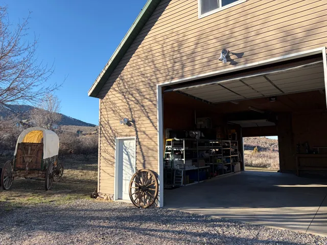 Garage featuring a mountain view
