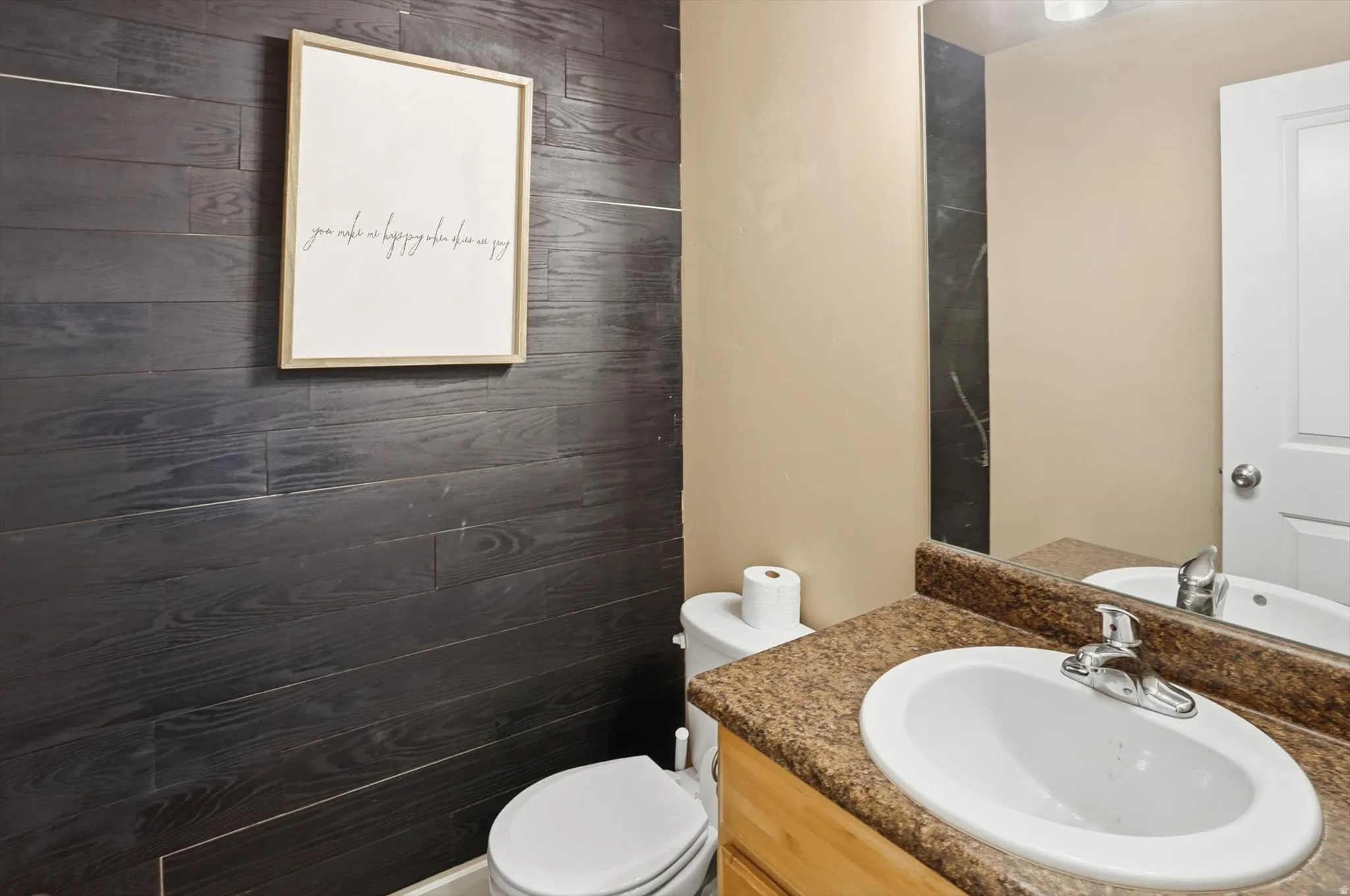 Half bath with toilet and vanity