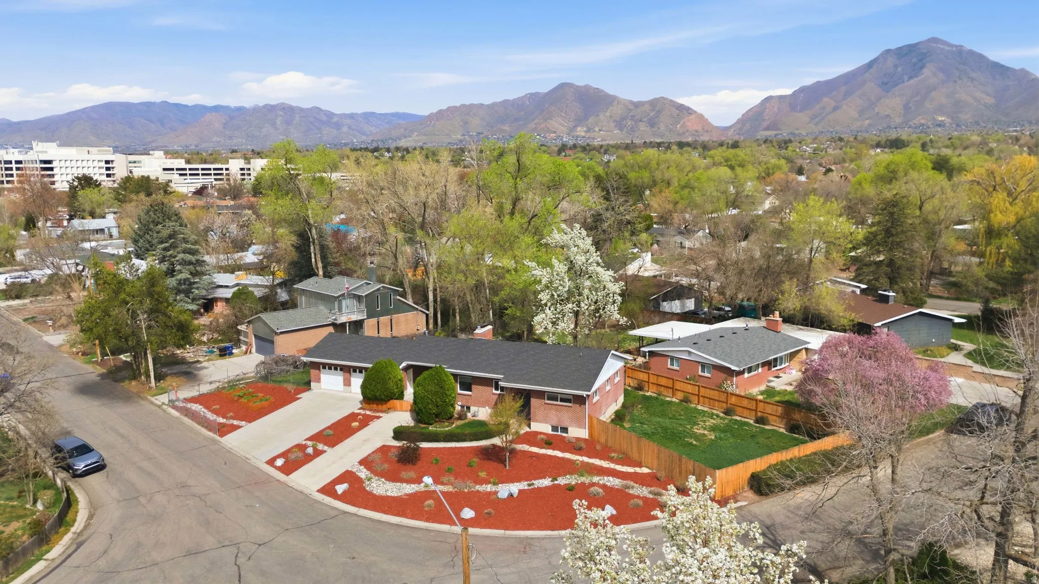 Aerial perspective of suburban area featuring mountains