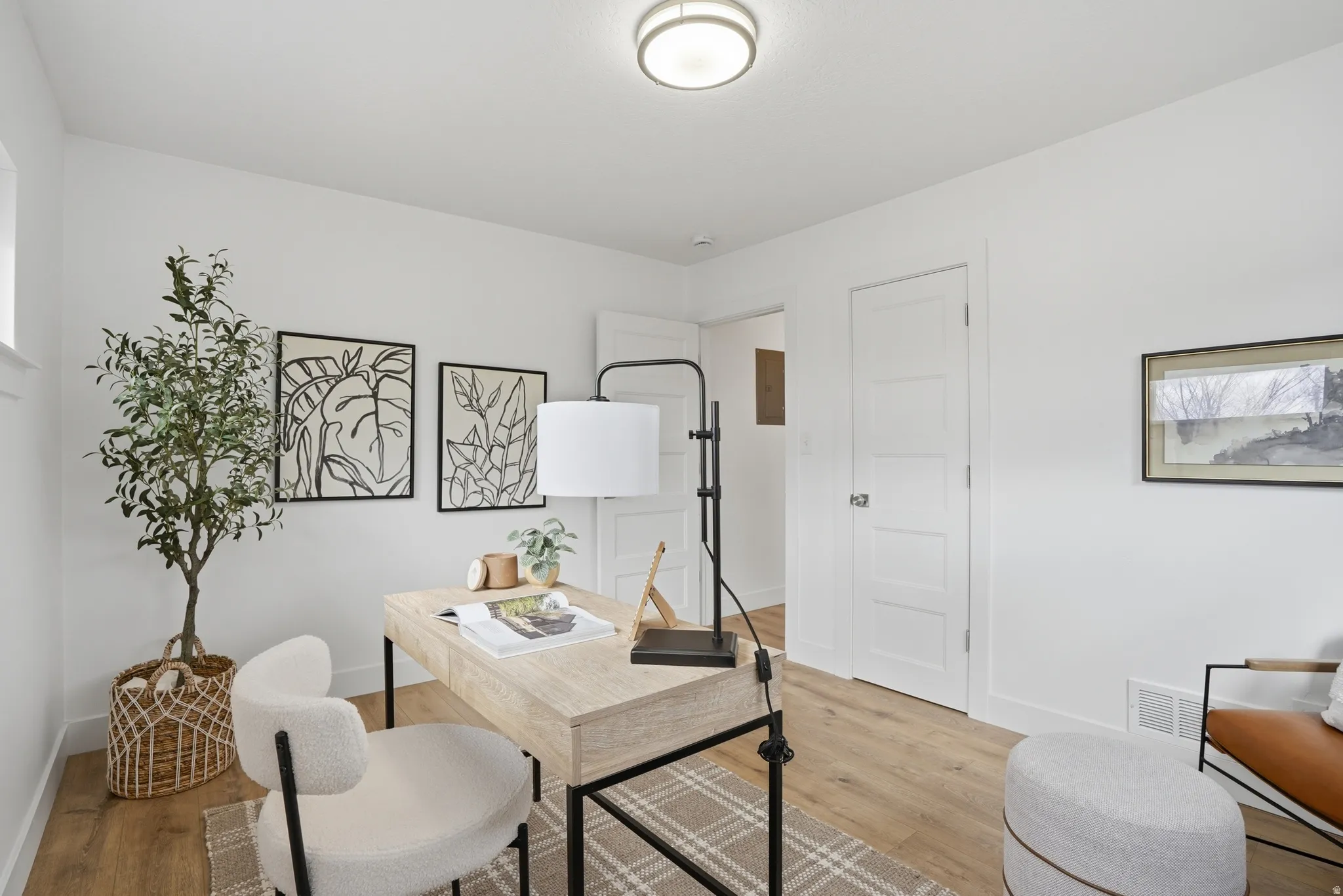Upstairs Office space featuring wood finished floors