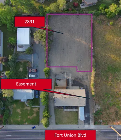Aerial view of property and surrounding area with property boundaries highlighted