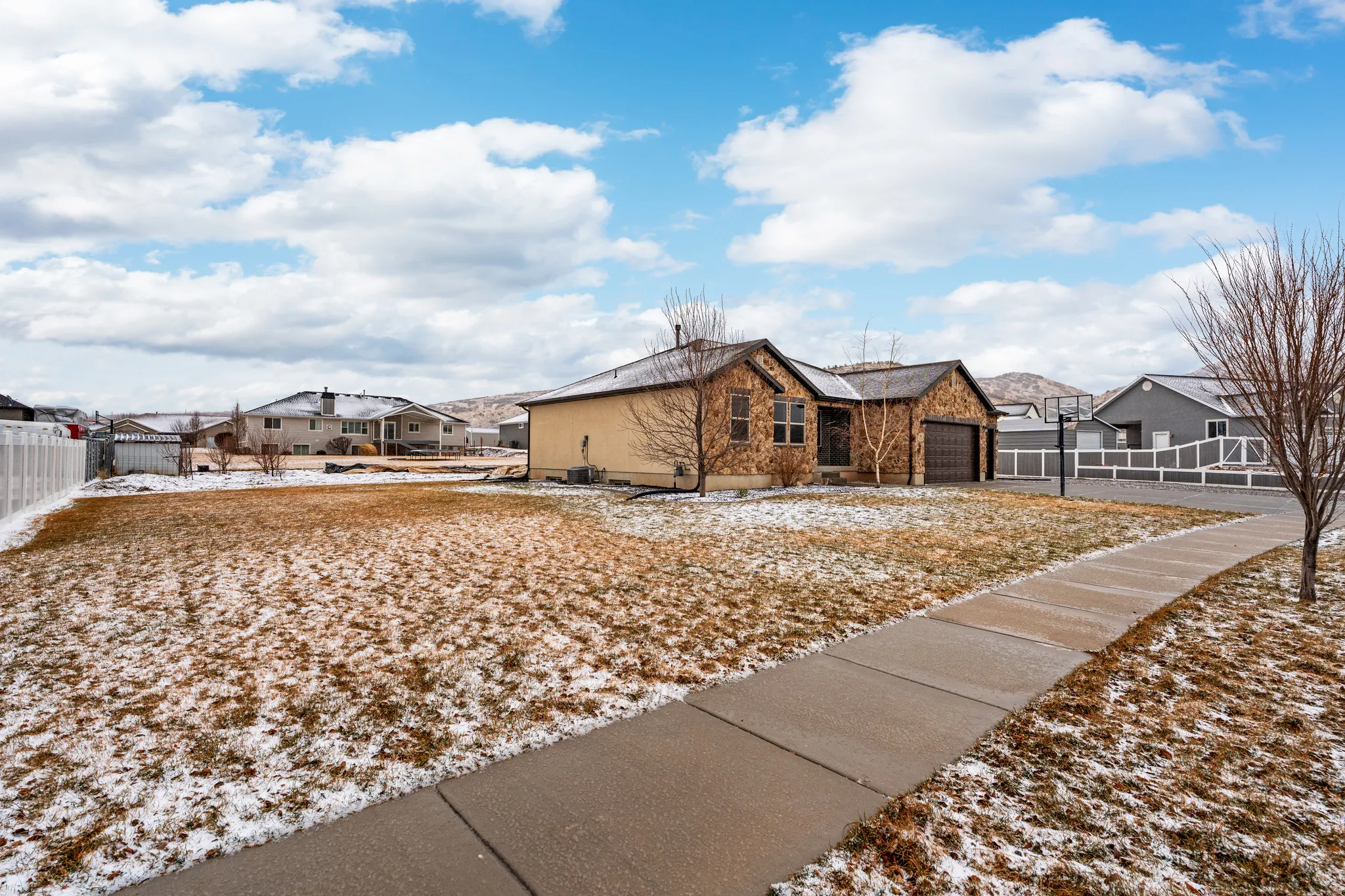 View of front facade with a residential view and an attached garage