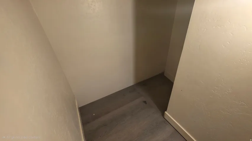 Detailed view of a textured wall and baseboards
