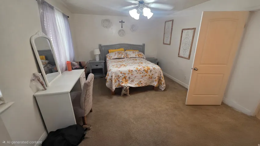 Bedroom featuring carpet floors and ceiling fan
