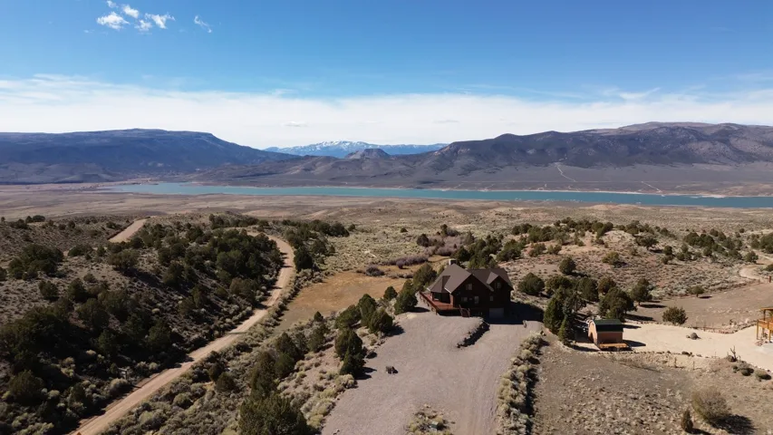 View of mountain backdrop with a nearby body of water