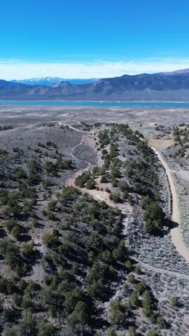 Drone / aerial view of mountains and a desert landscape