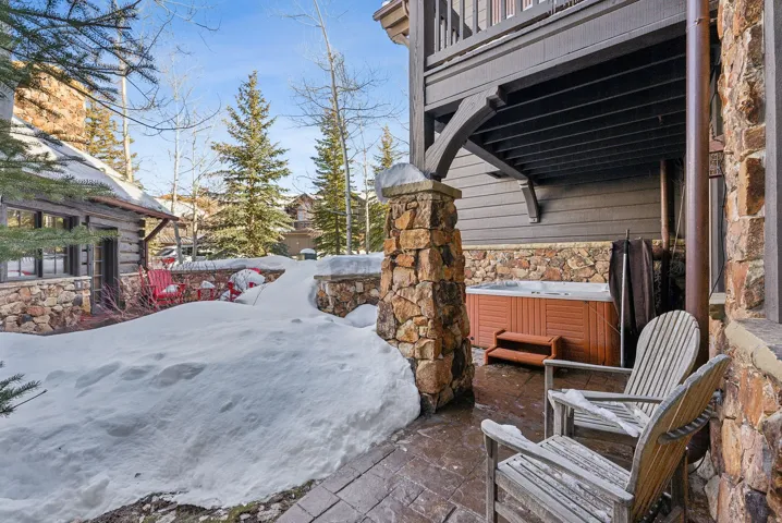 Patio / terrace featuring a hot tub and a patio