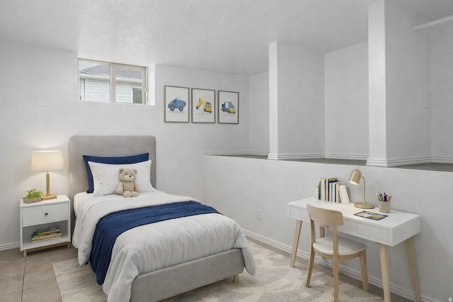Bedroom featuring a textured ceiling and light tile patterned flooring