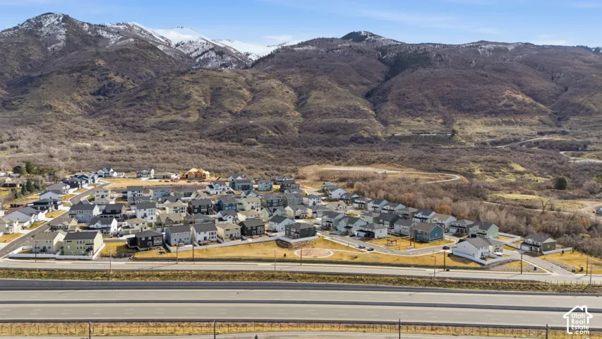 View of mountain backdrop with nearby suburban area