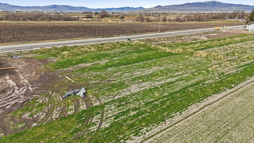 View of yard with agricultural plots, a mountain view, and a view of countryside