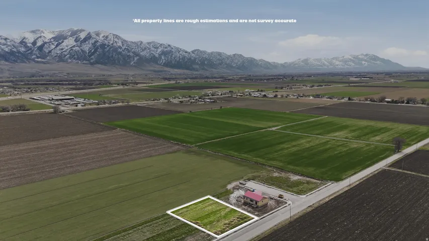 View of rural area with abundant farmland and a mountainous background