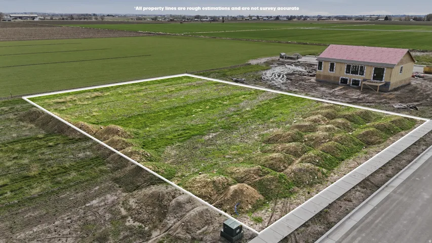 View of rural area featuring large plots for crops