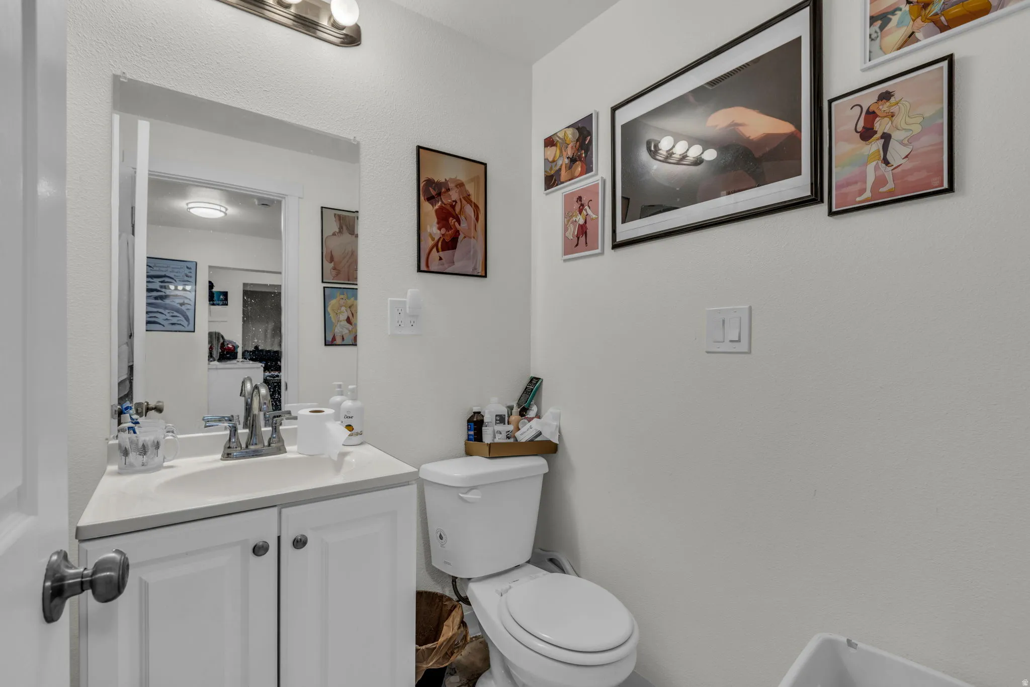 Half bath with toilet and vanity