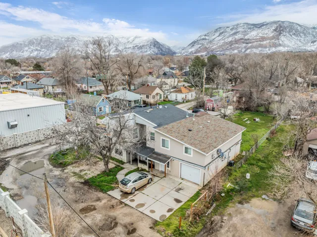 Aerial view of residential area with mountains