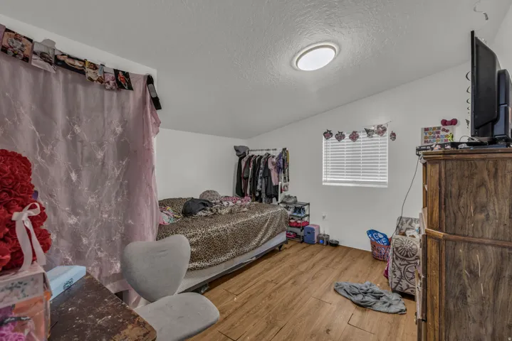 Bedroom with light wood finished floors