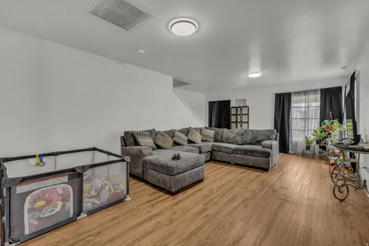 Living area featuring light wood-style flooring