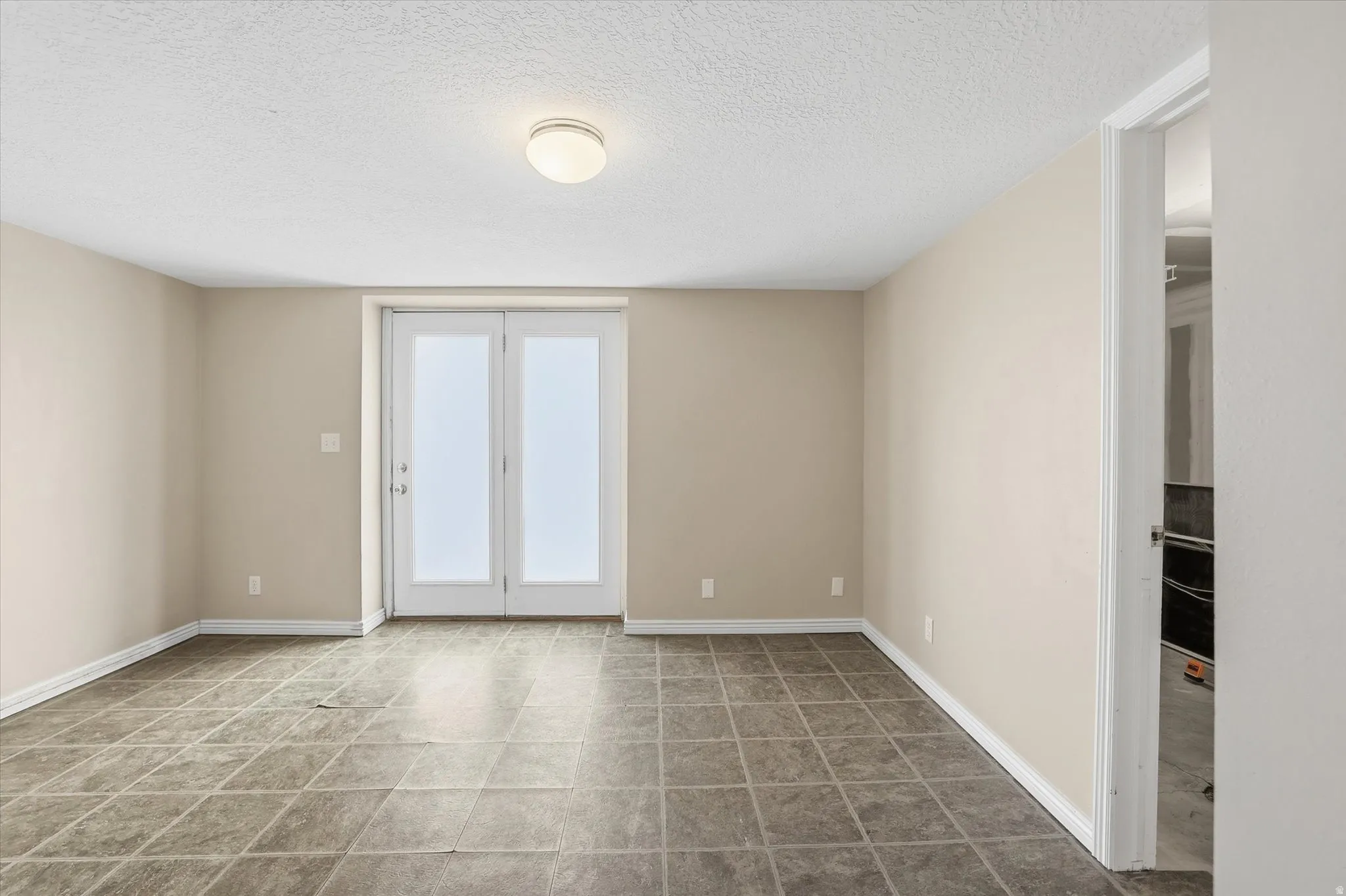 Family room off the golf course side (east)