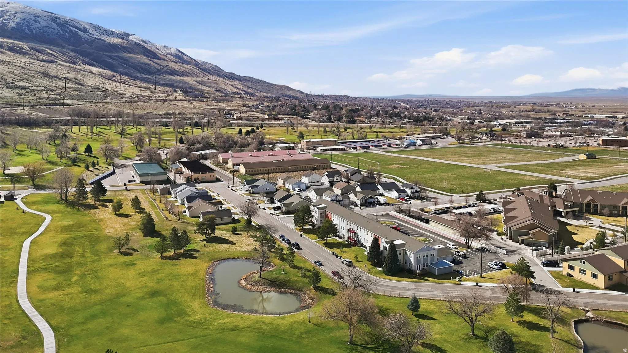 South facing view with golf course and town hones