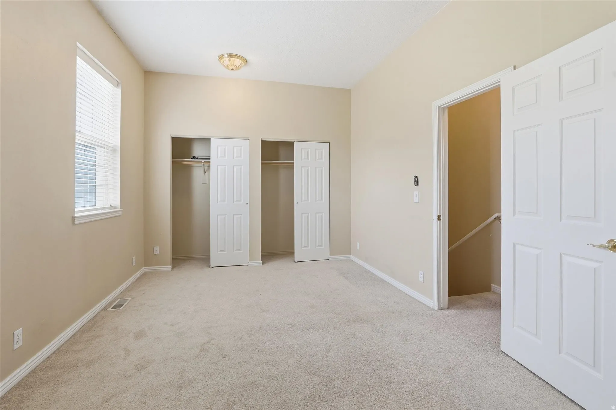 Bedroom with two closets