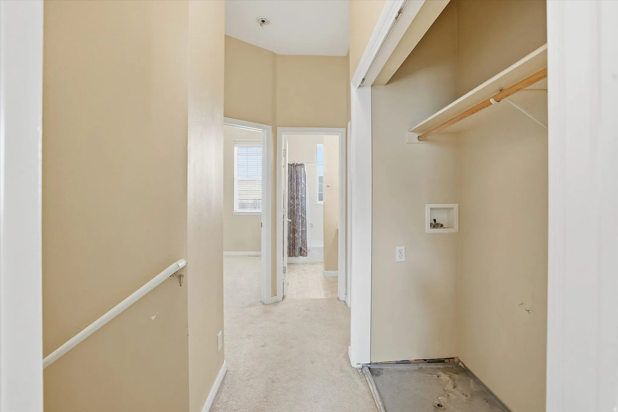 Laundry area between the two bedrooms