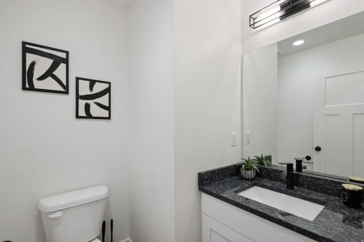 Bathroom with vanity and toilet