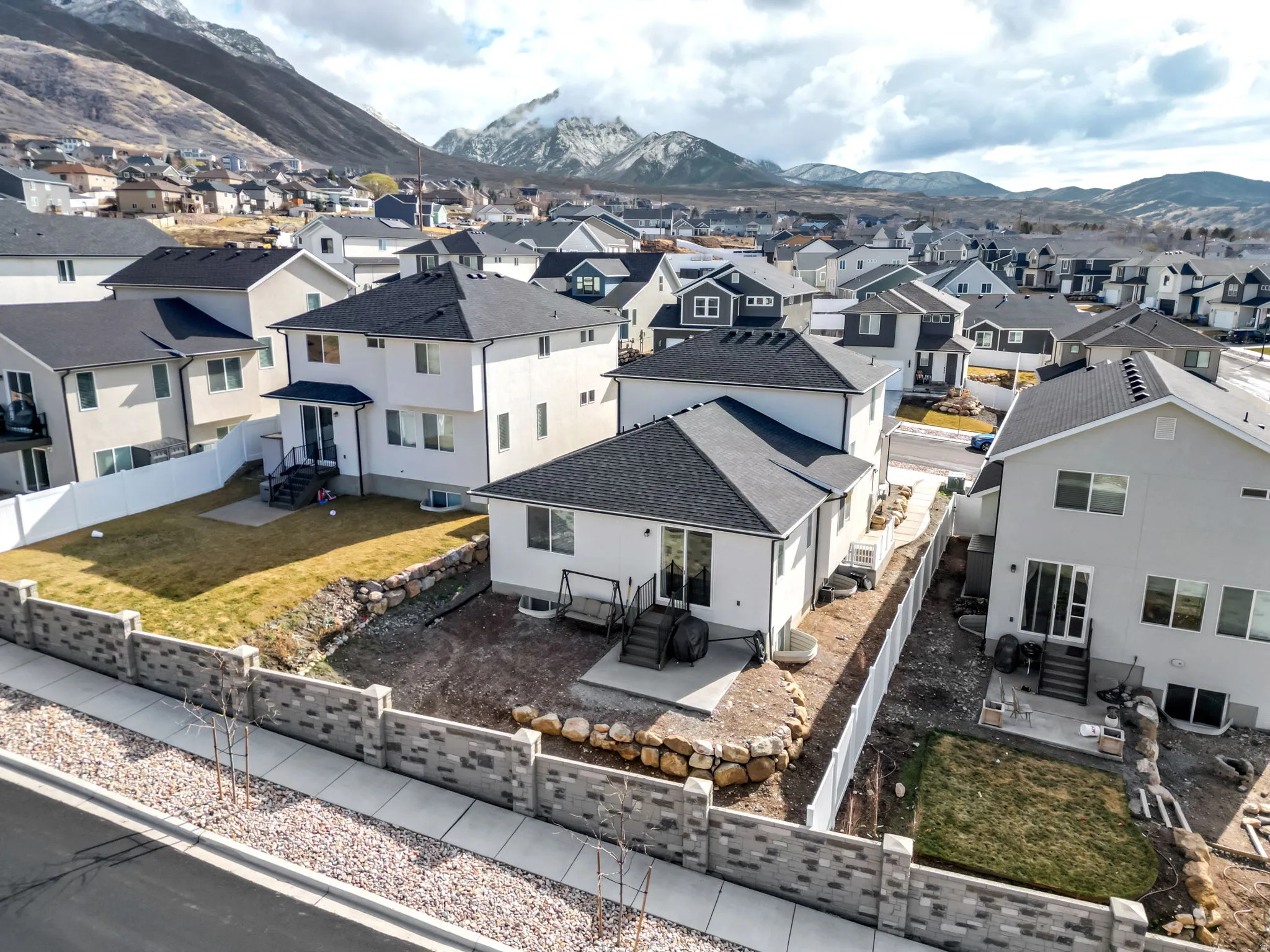Aerial view of residential area with a mountain backdrop