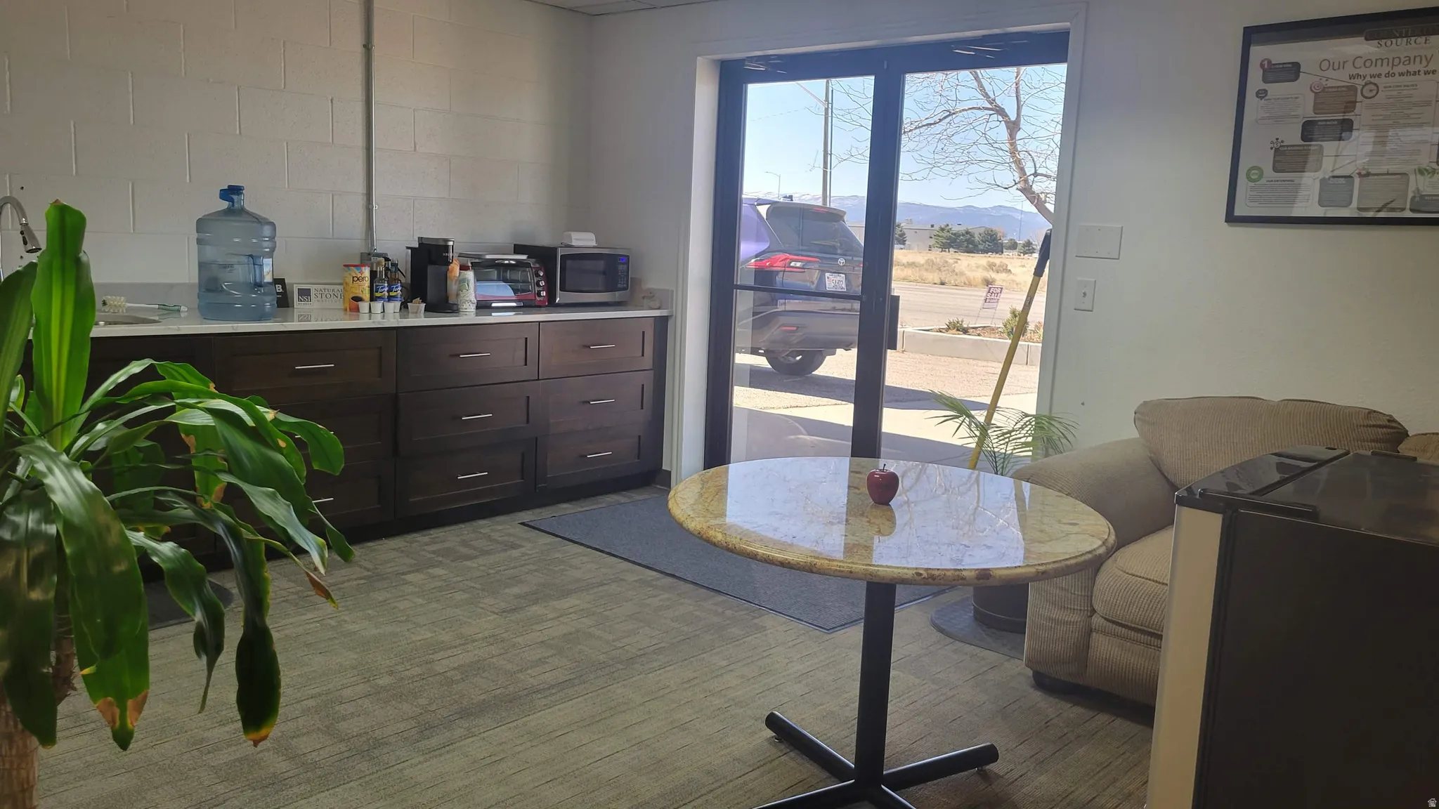 Dining room with concrete block wall