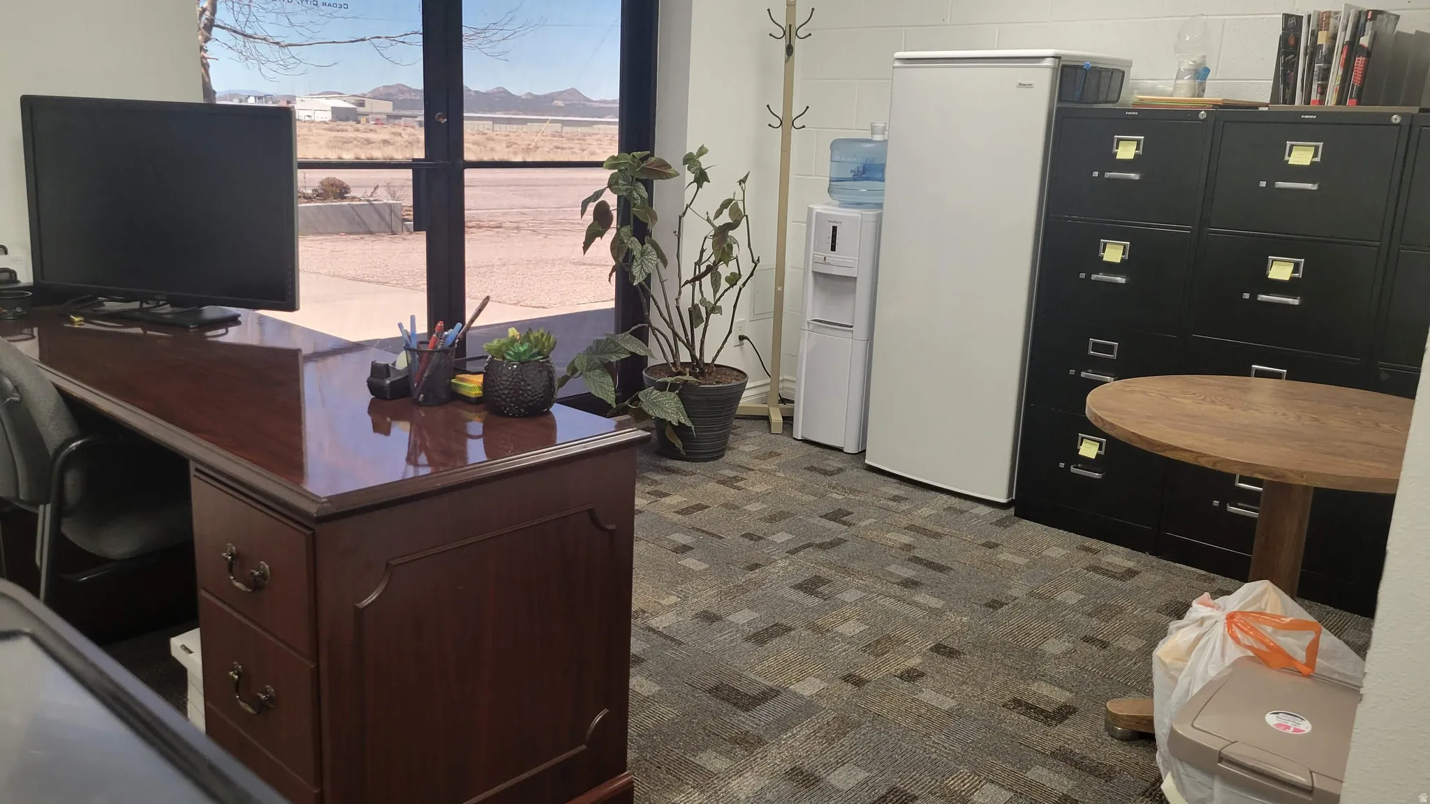 Office with dark carpet