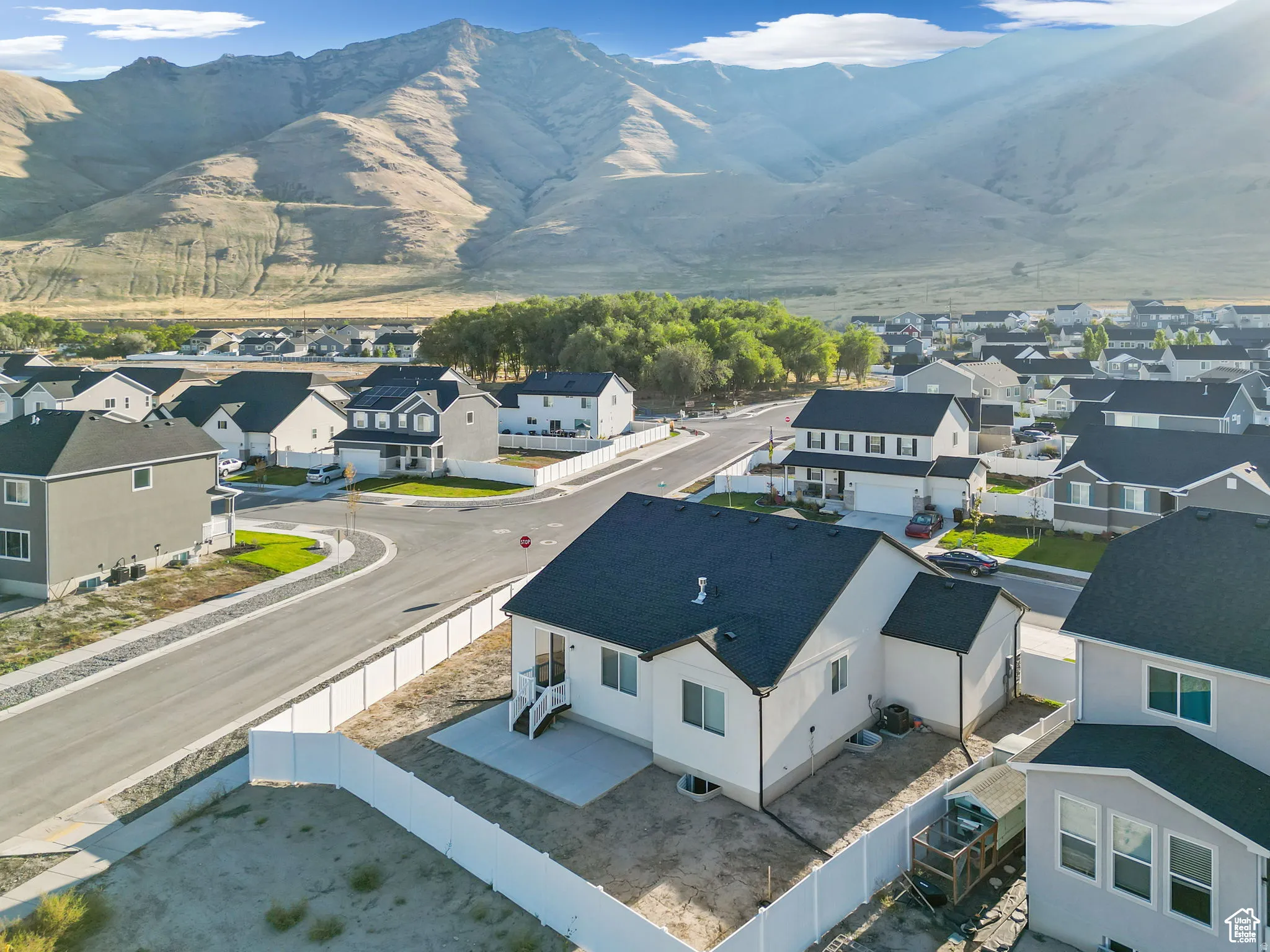 Aerial perspective of suburban area featuring mountains