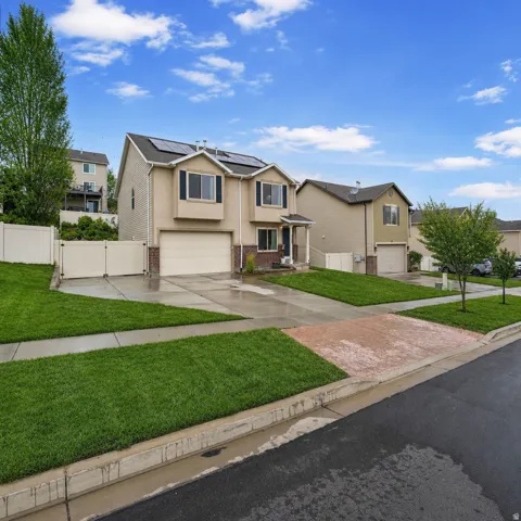 Yard has been virtually staged to show summertime look