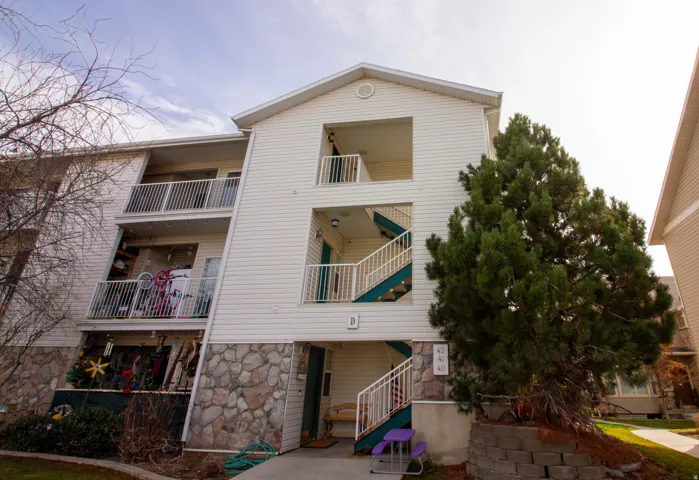View of apartment building / complex with stairway