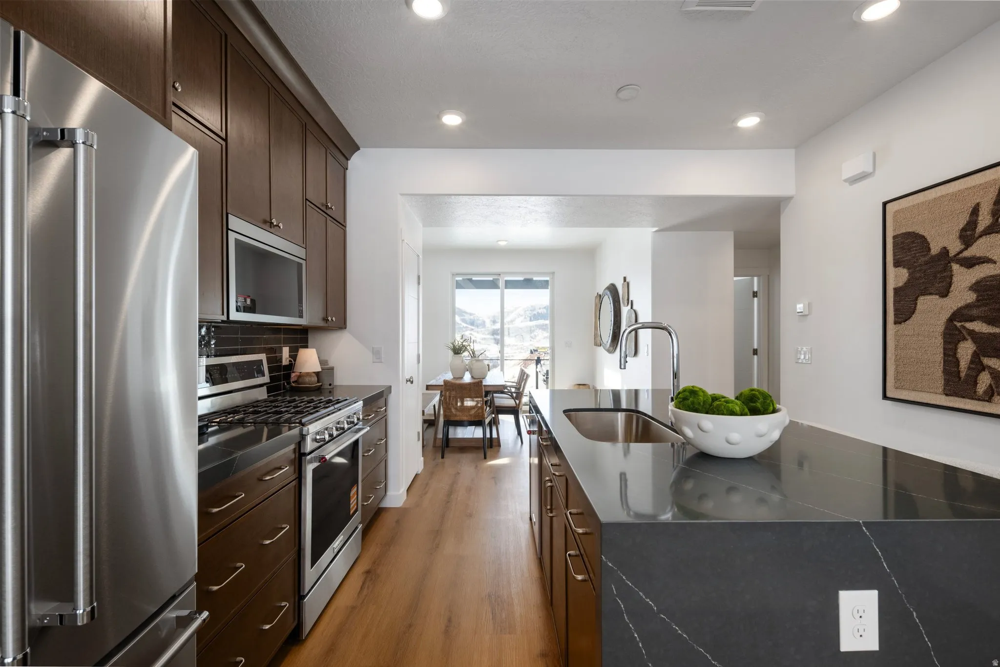 A chef-inspired kitchen designed for gathering, cooking, and entertaining. *Model Home