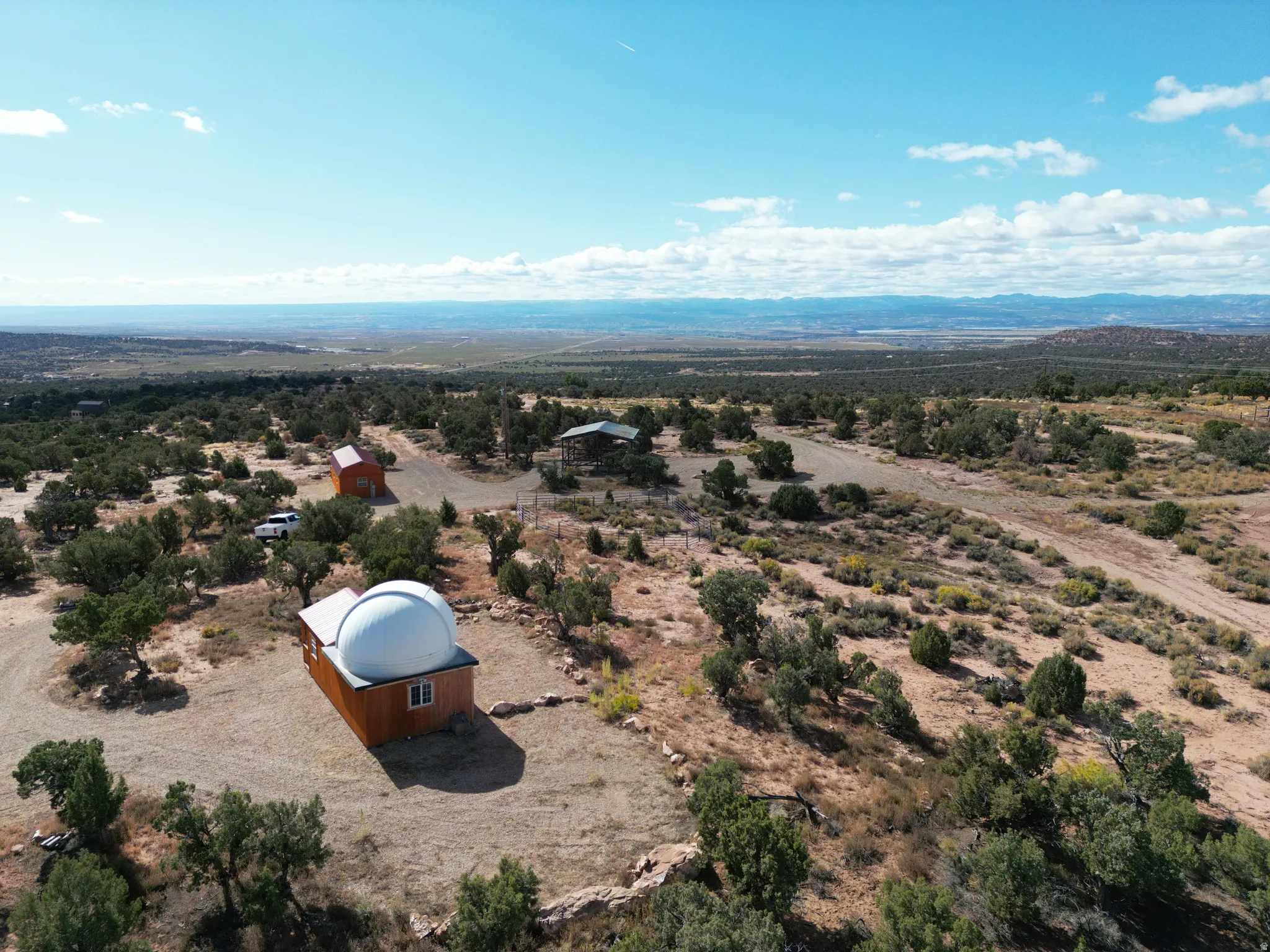 Overview of rural landscape featuring a desert landscape and mountains