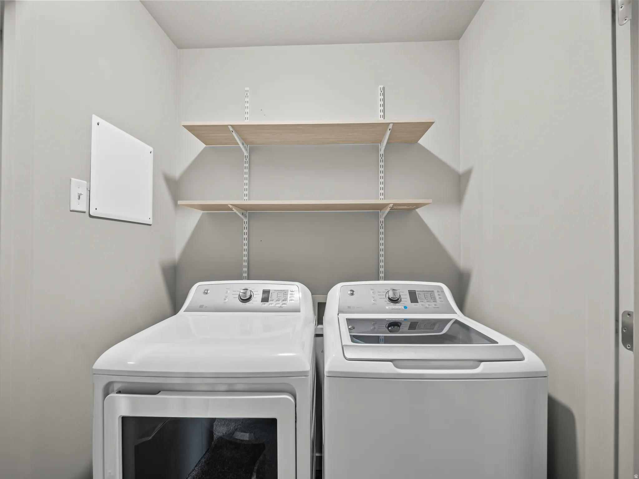 Laundry room featuring washing machine and dryer