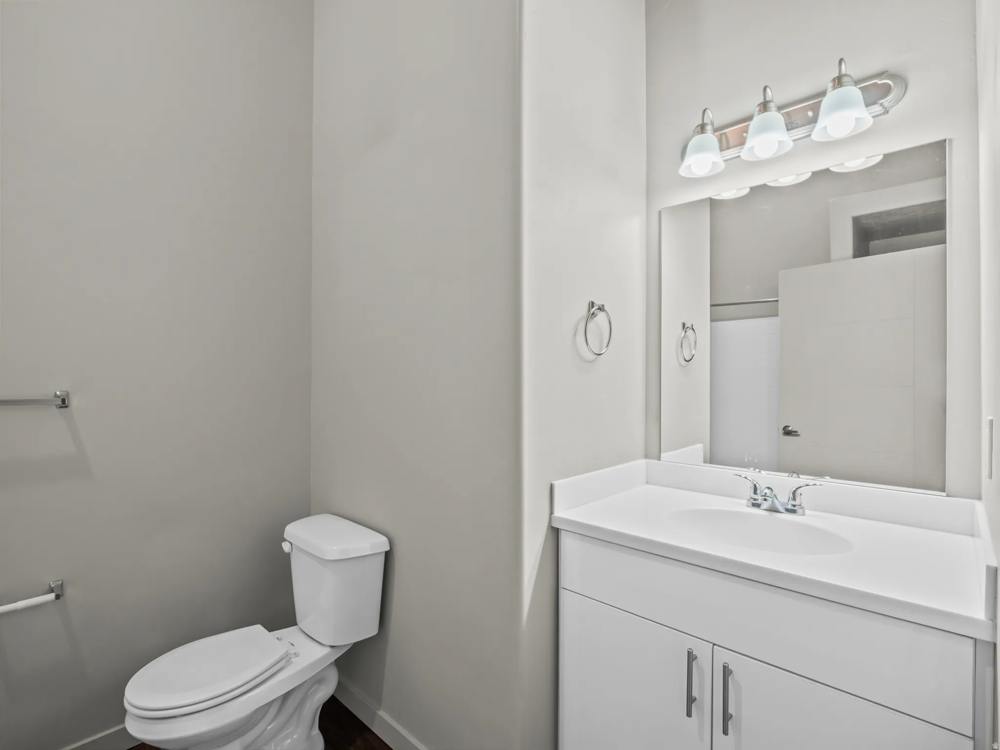 Bathroom with vanity and toilet