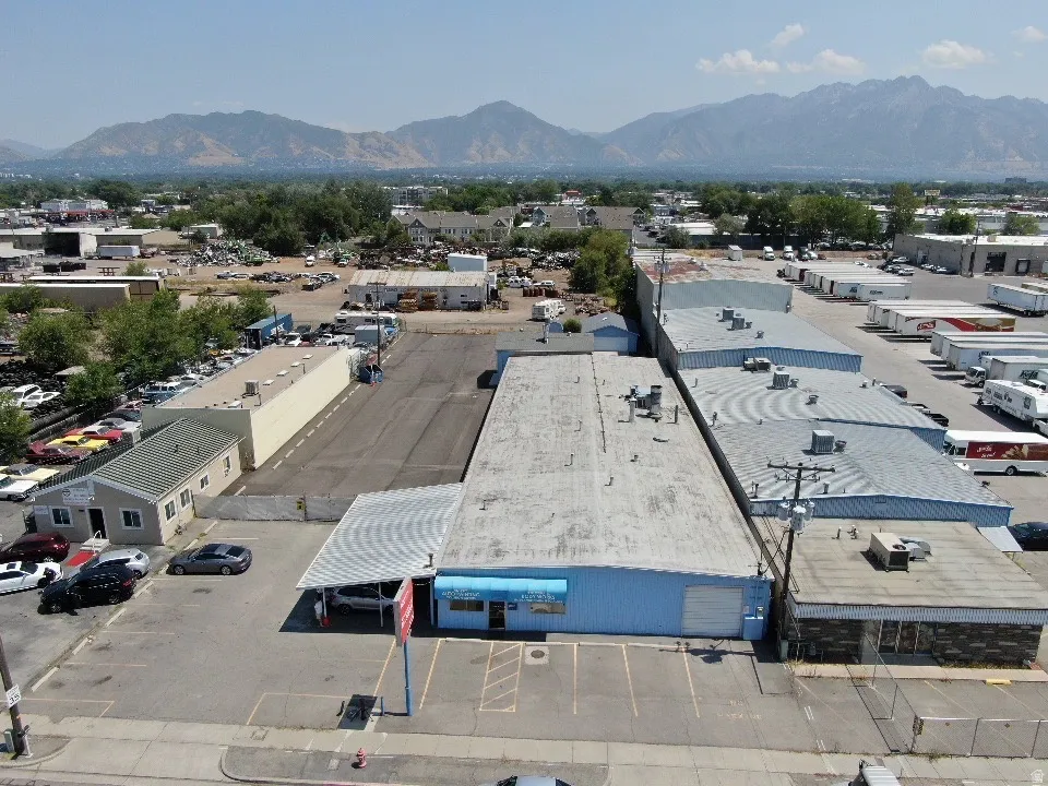 Aerial view of mountains and an industrial area