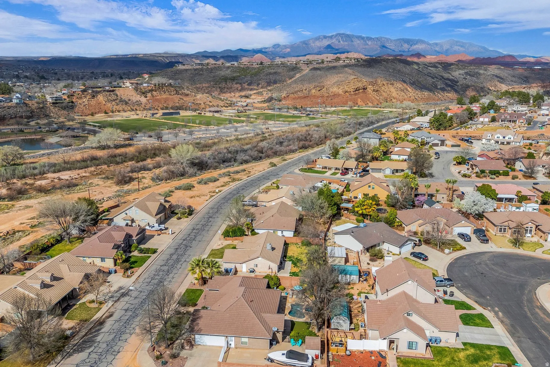 Aerial view of residential area with a mountain backdrop