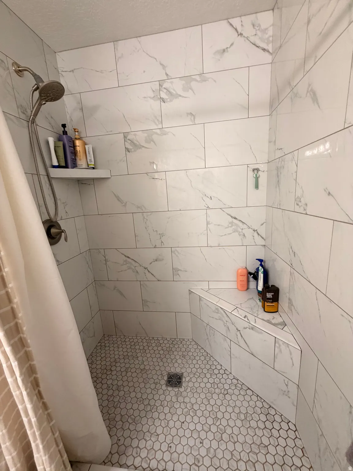 Bathroom featuring a stall shower