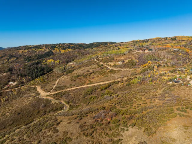 Aerial view of sparsely populated area with mountains