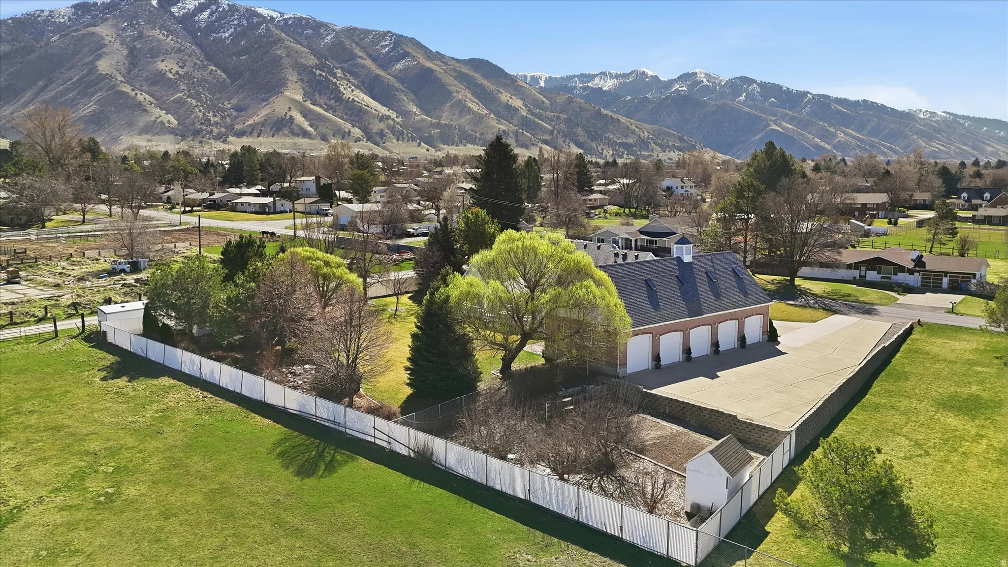 View of mountain background featuring nearby suburban area