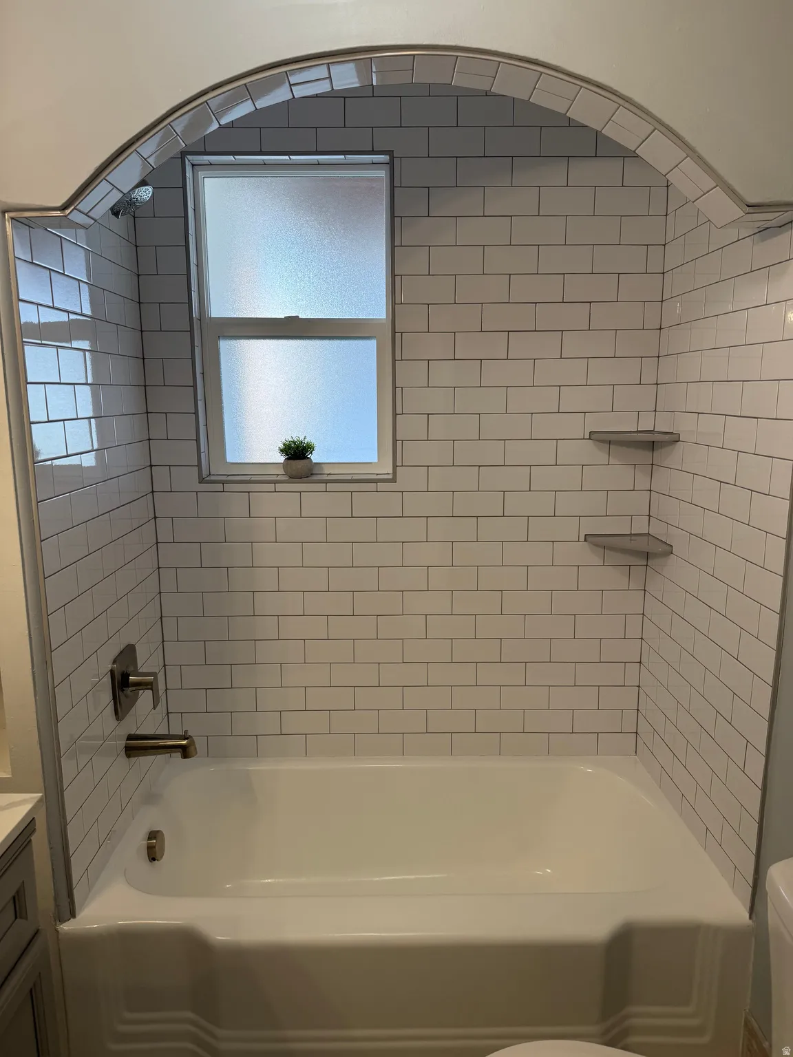 Full bathroom with vanity and shower / tub combination