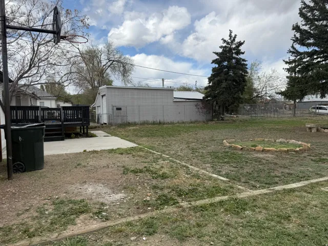 View of yard with a deck