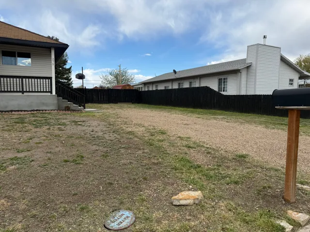 View of fenced backyard