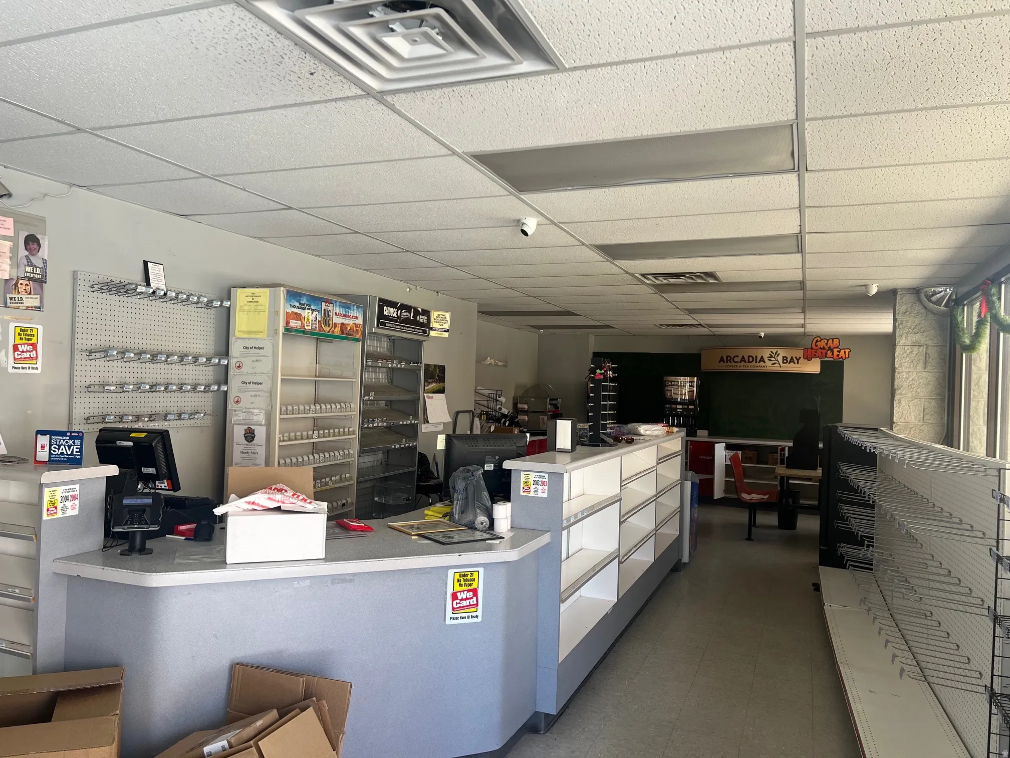 Kitchen featuring a drop ceiling and light countertops