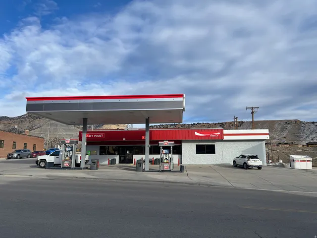 View of commercial location featuring uncovered parking and a mountain view