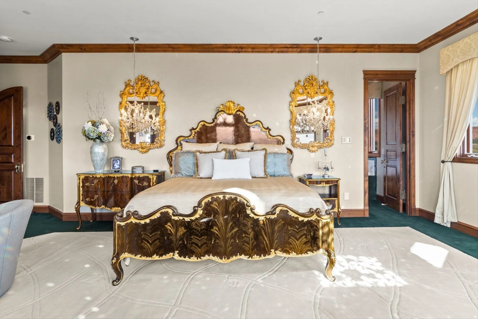 Recessed lighting, crown molding, a window with drapery, wood-finish door, and wall-to-wall carpeting